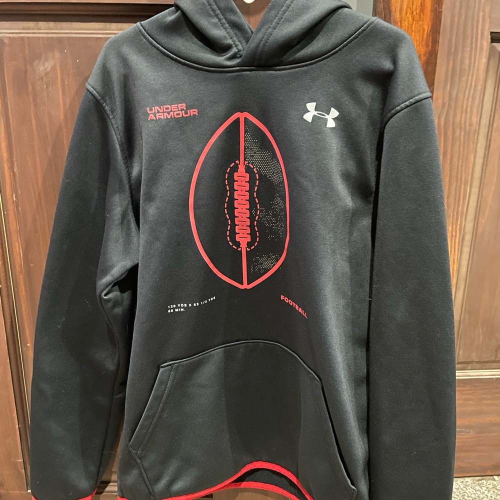 Boys Under Armour Football Sweatshirt. Medium.